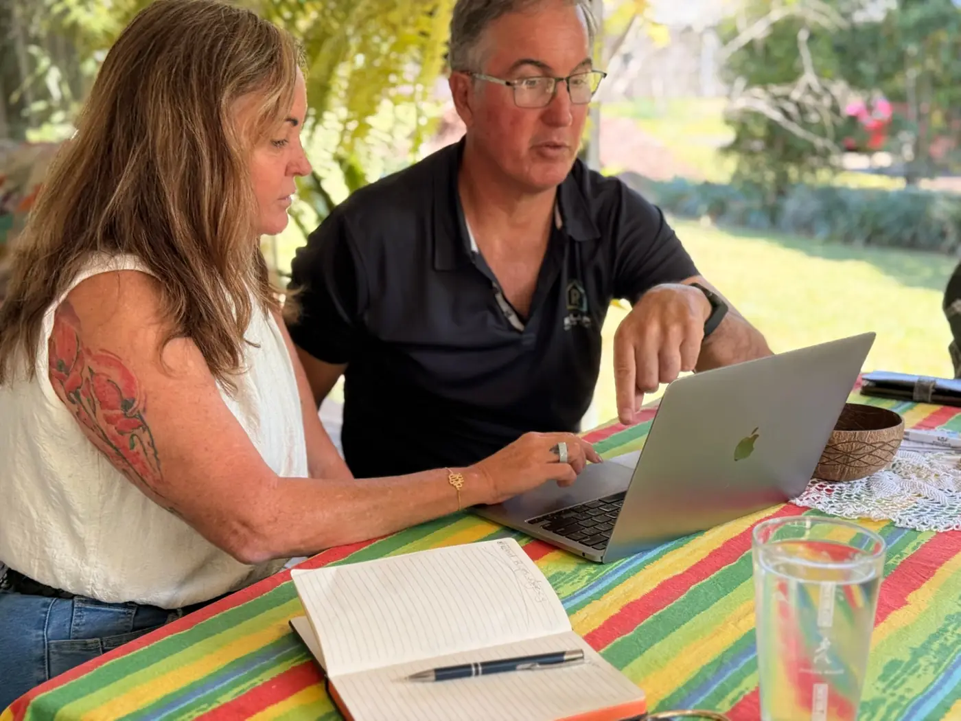A business owner reviewing their marketing plan on a laptop